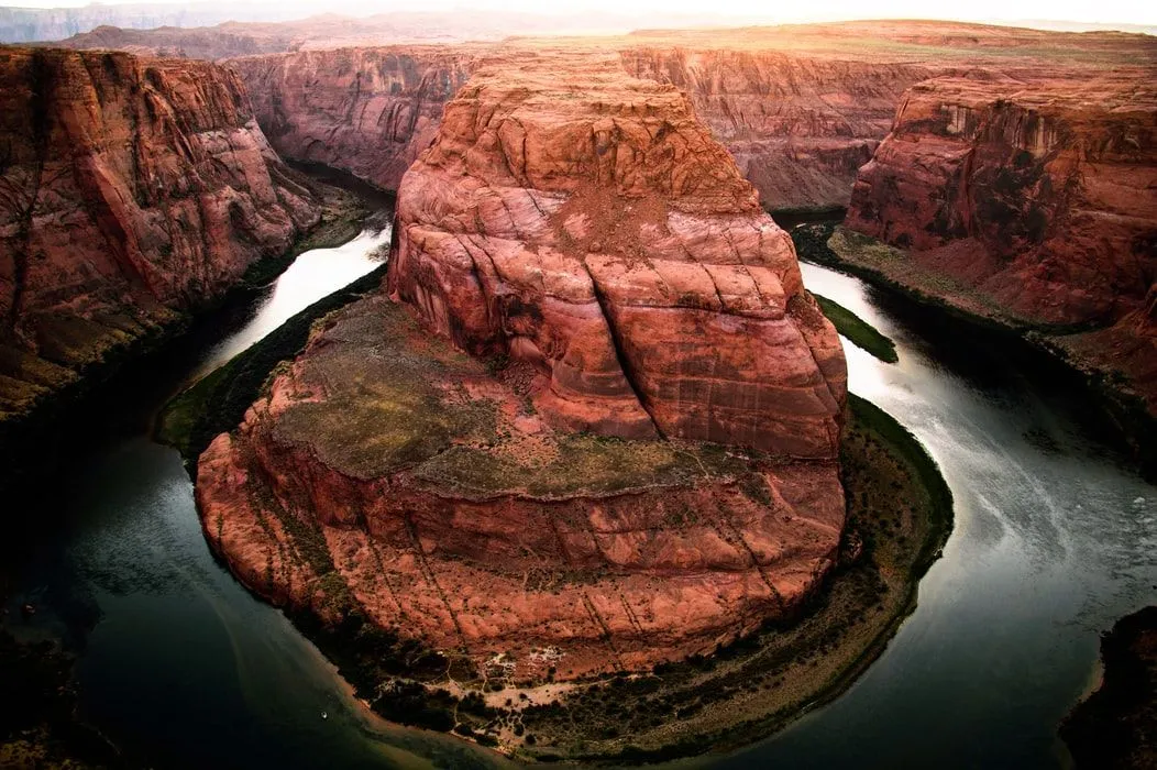 Aerial view of Horseshoe Bend curving around the Colorado River